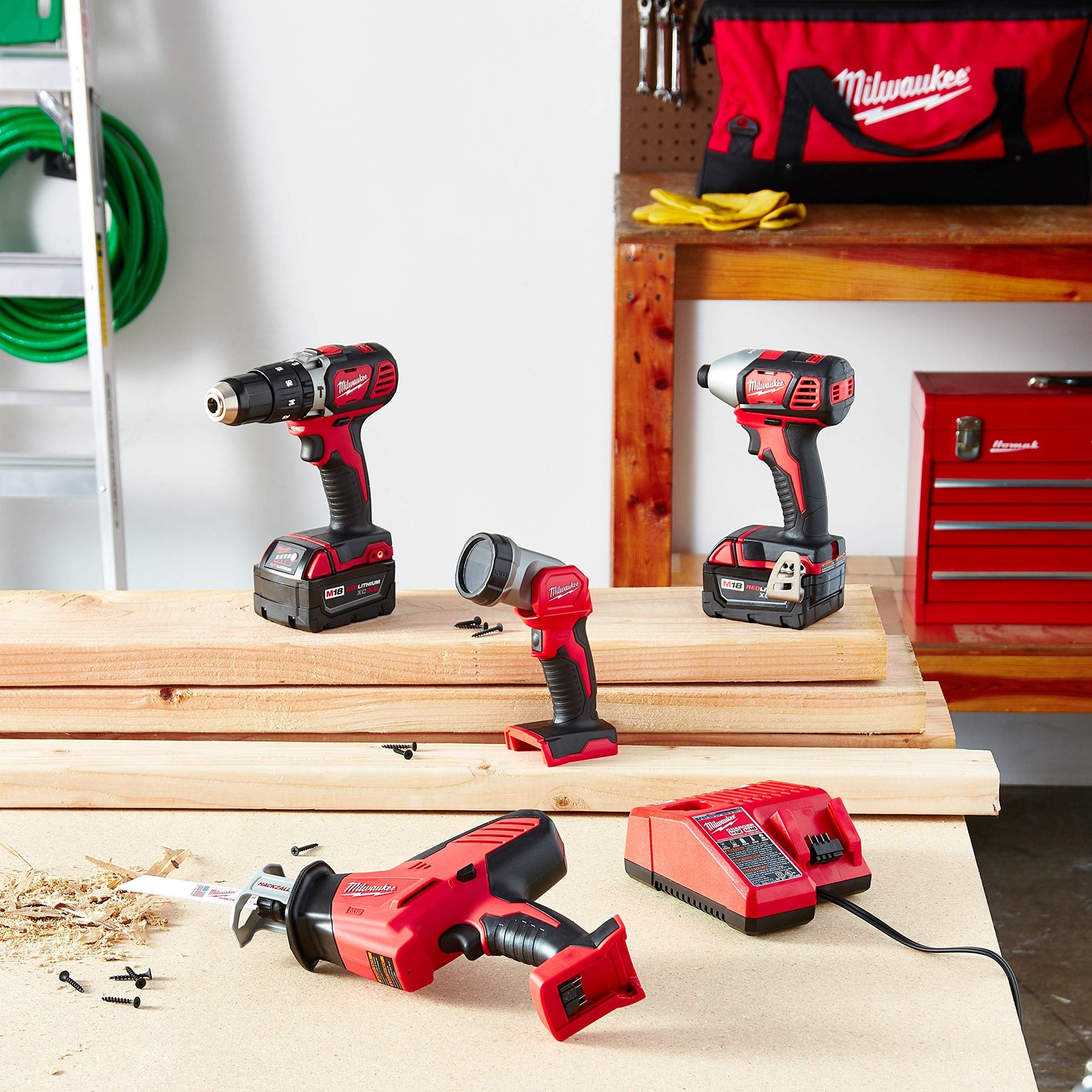 Milwaukee 2695-24 M18 18V Cordless Power Tool Combo Kit with Hammer Drill, Impact Driver, Reciprocating Saw, and Work Light (2 Batteries, Charger, and Tool Case Included)